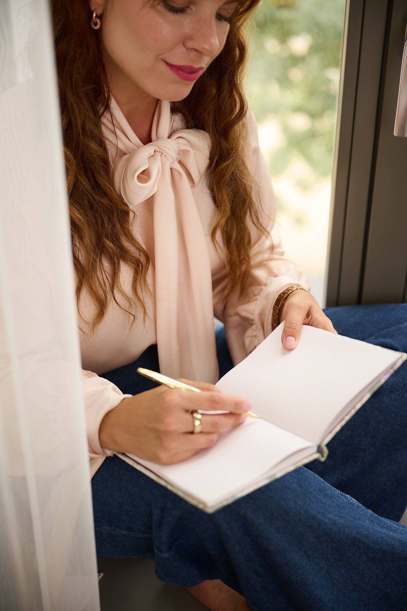 A founder photographed in soft window light
