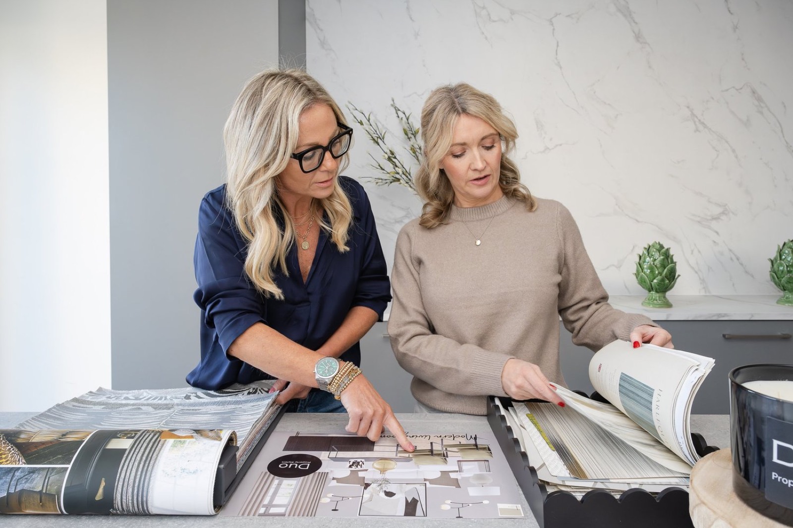 Caroline and Jane looking through samples