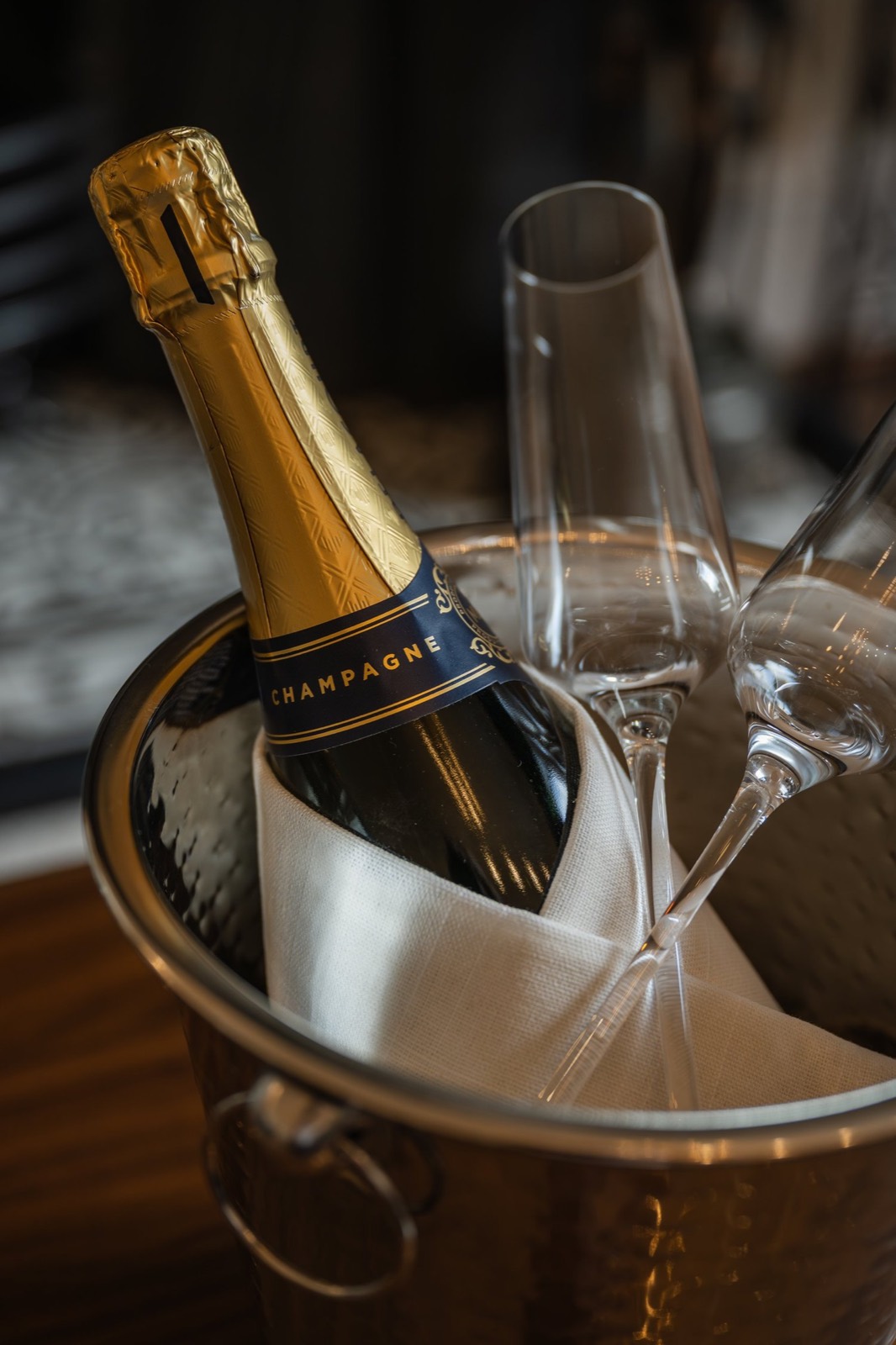 Champagne on ice with two glasses