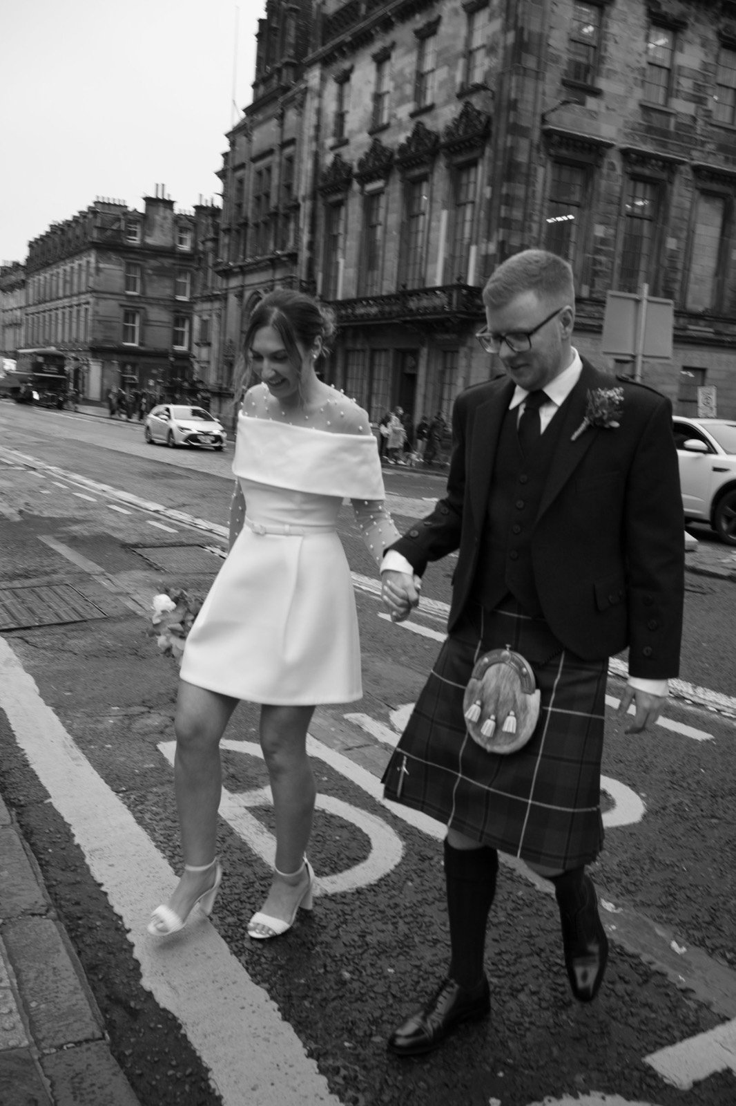 Kristina and Jordan crossing an Edinburgh street